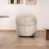 Meuble House Chauffeuse effet boule avec surpiqures en tissu bouclette beige tramé "Sweet Culture" esprit cocoon New
