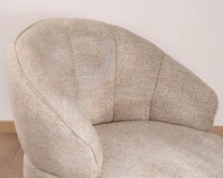 Meuble House Chauffeuse effet boule avec surpiqures en tissu bouclette beige tramé
