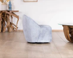 Meuble House Chauffeuse tournante design épuré en tissu bleu glacier