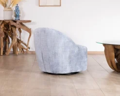 Meuble House Chauffeuse tournante design épuré en tissu bleu glacier