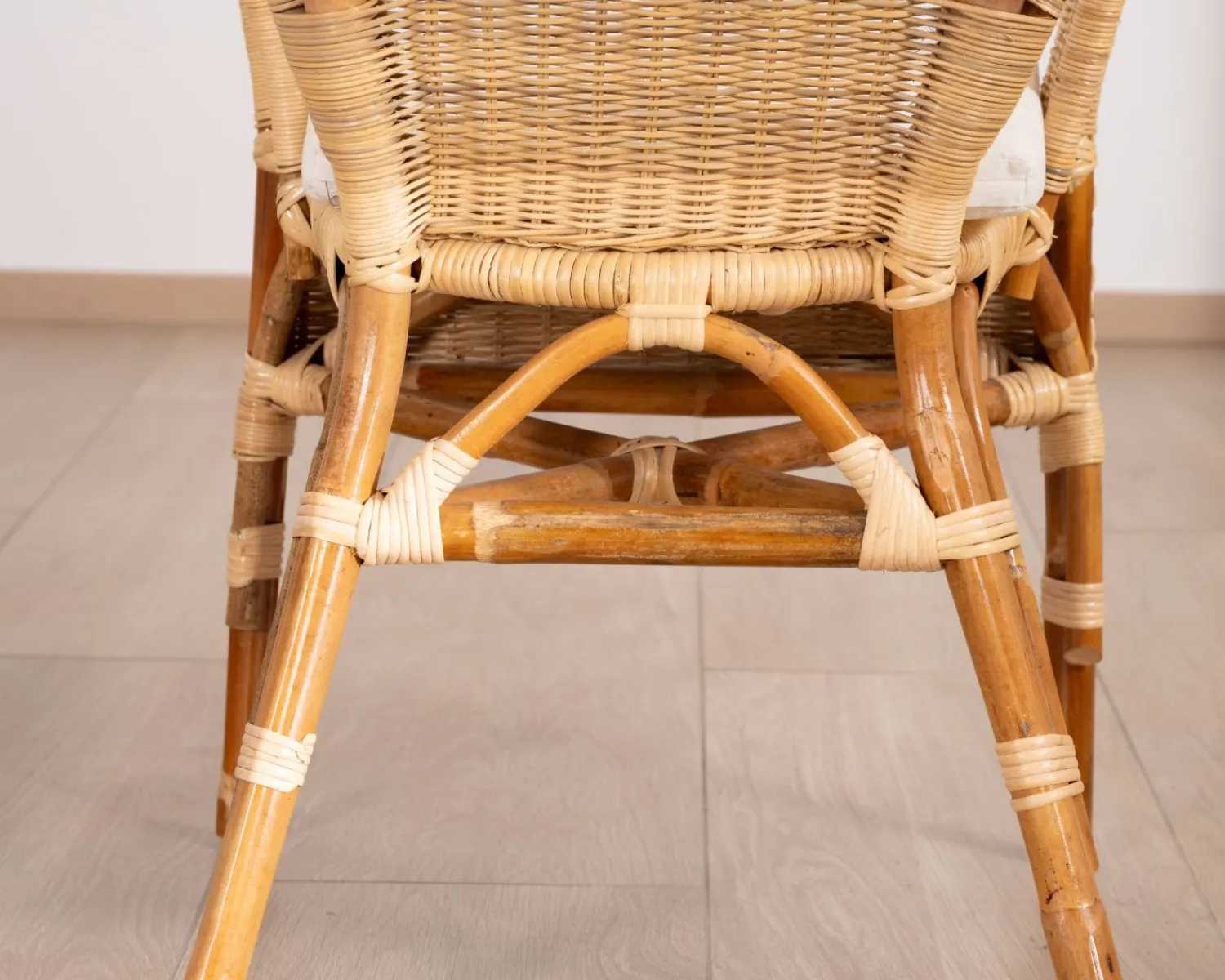 Meuble House Elégant petit fauteuil en rotin tressé avec assise tissu "Noho" New