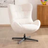 Meuble House Fauteuil pivotant cocooning en tissu bouclette blanc cassé "Calista" forme enveloppante