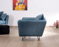 Meuble House Grand fauteuil cosy en tissu bleu et pieds en métal noir
