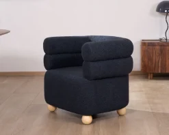 Meuble House Petite chauffeuse enveloppante en tissu bleu foncé 