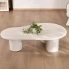 Meuble House Table basse forme organique en micro-ciment teinté crème "Naura"