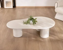 Meuble House Table basse forme organique en micro-ciment teinté crème "Naura"