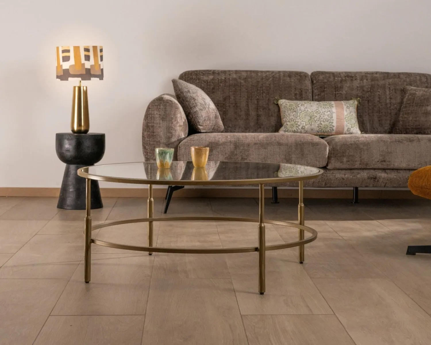 Meuble House Table basse ronde 90 cm en laiton doré et plateau verre "Gilt Antique" style contemporain chic Hot