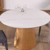 Meuble House Table ronde 120 cm plateau céramique blanc effet marbre "Oria" piètement aspect chêne Discount